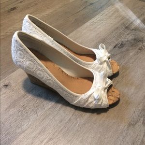 White eyelet wedges